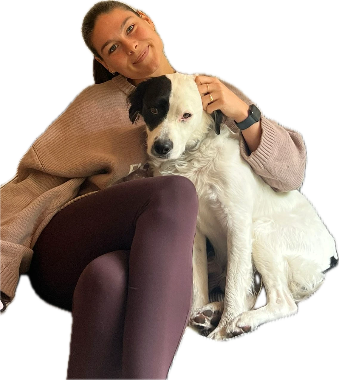 Max met een zwart-witte hond op schoot